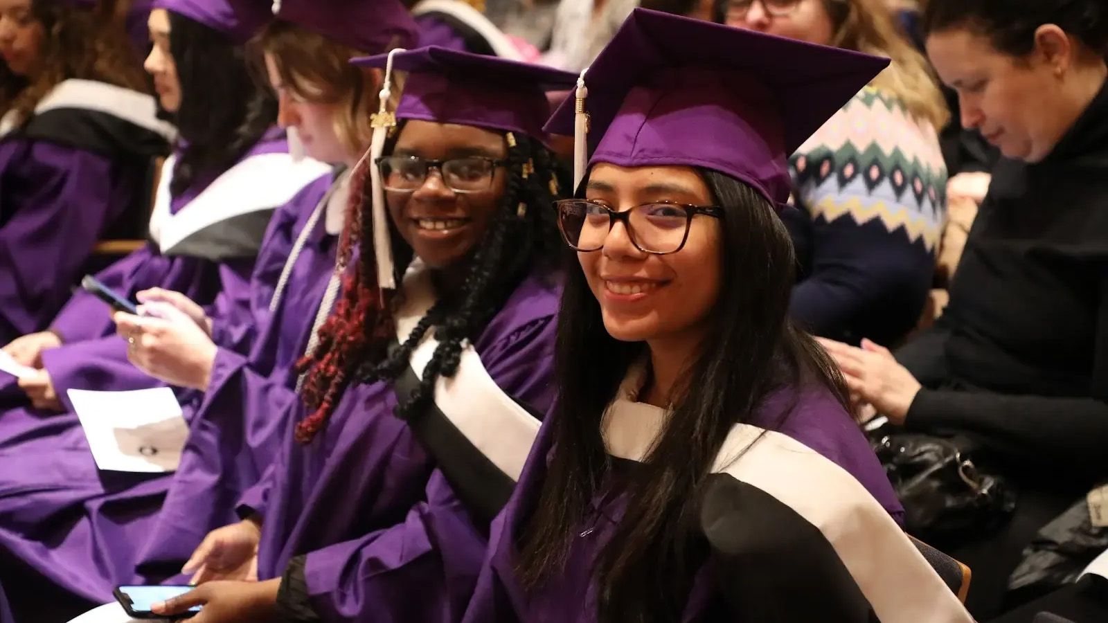 two students at the graduation ceremony for sociology