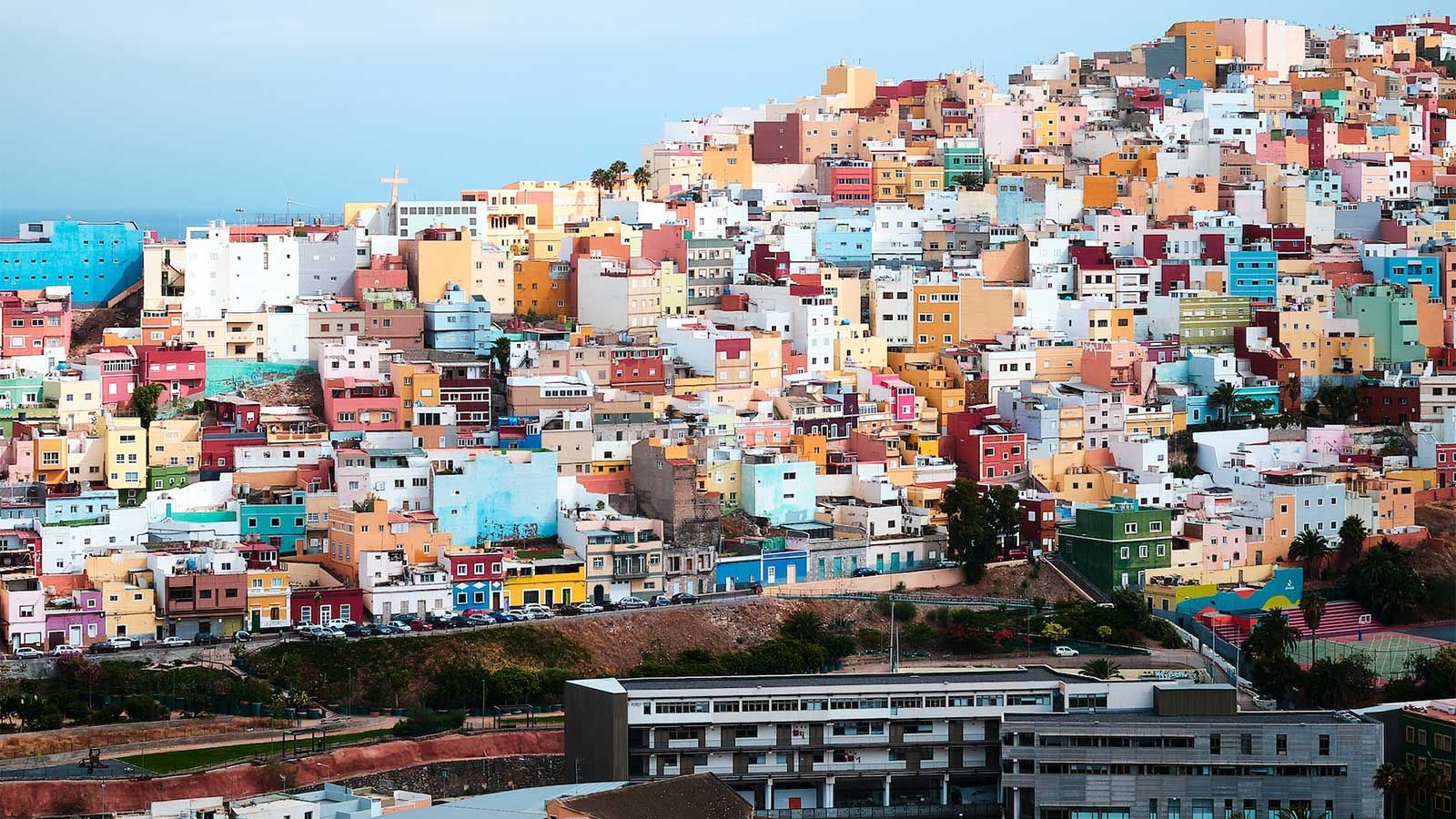 Photo of the colorful homes rising up the hills of Canary Island, Spain