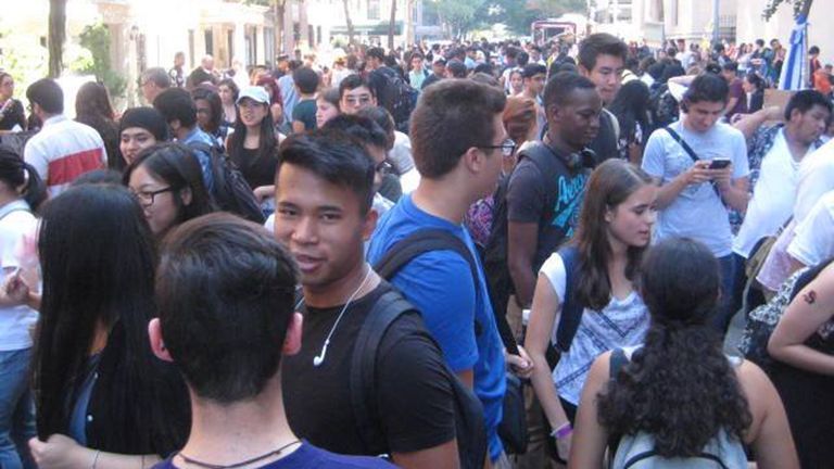 students gathering on the street