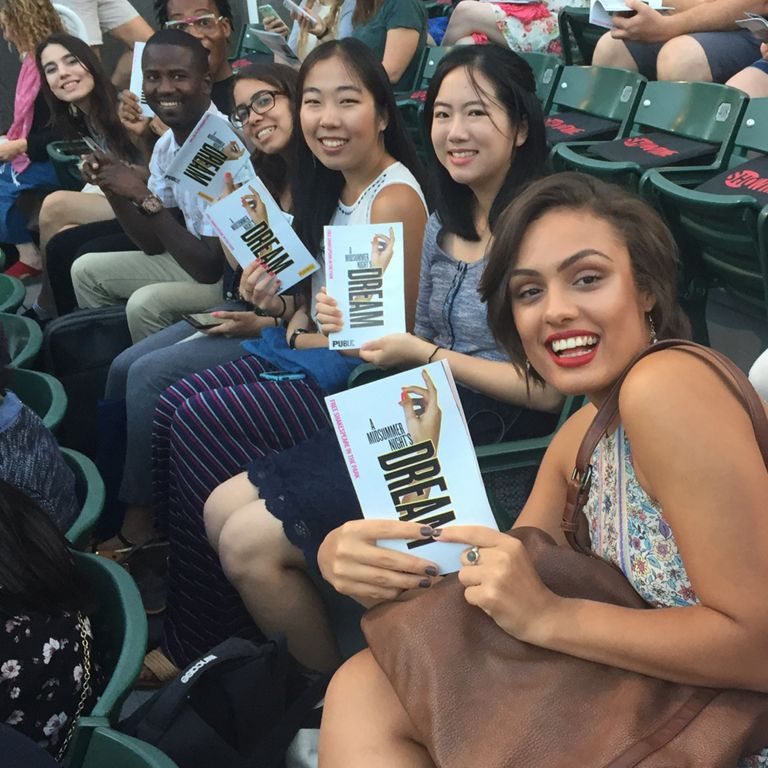 Students smile for photo at Shakespeare in The Park.
