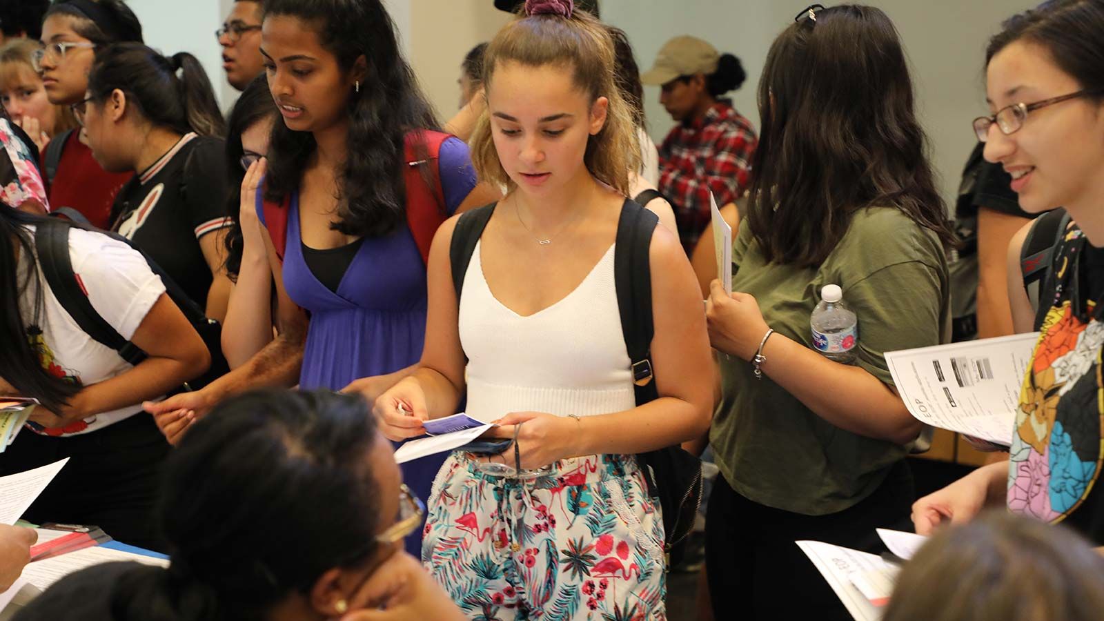 hunter students at a resource fair table