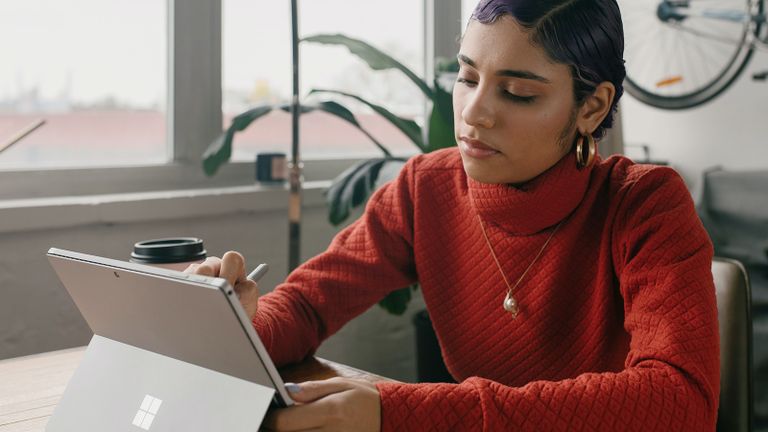 woman on surface computer