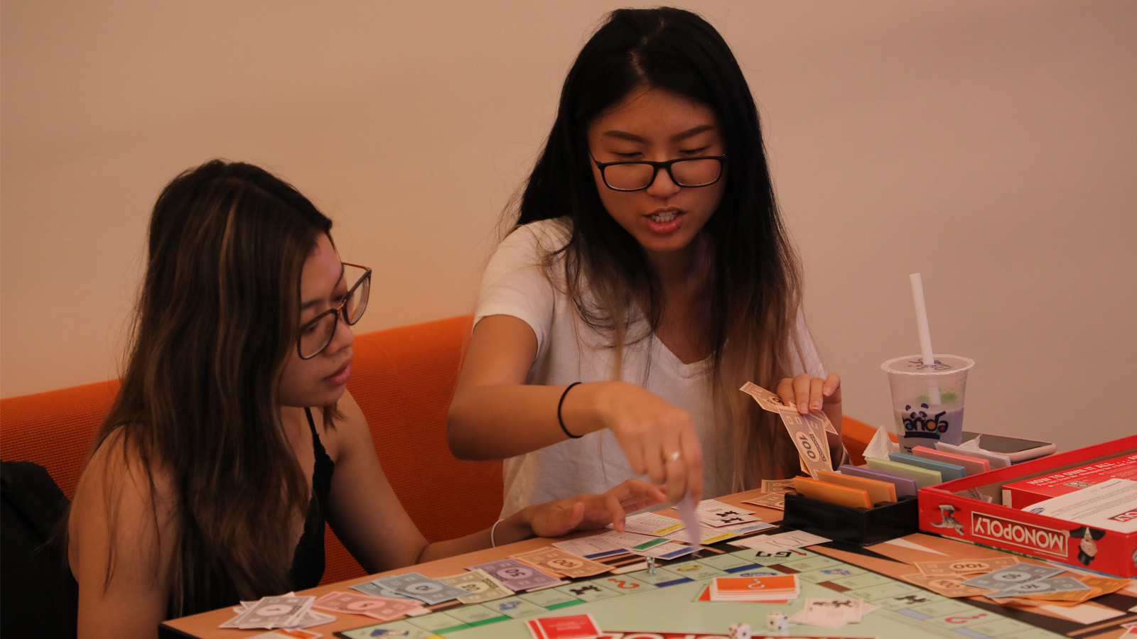 Students playing monopoly