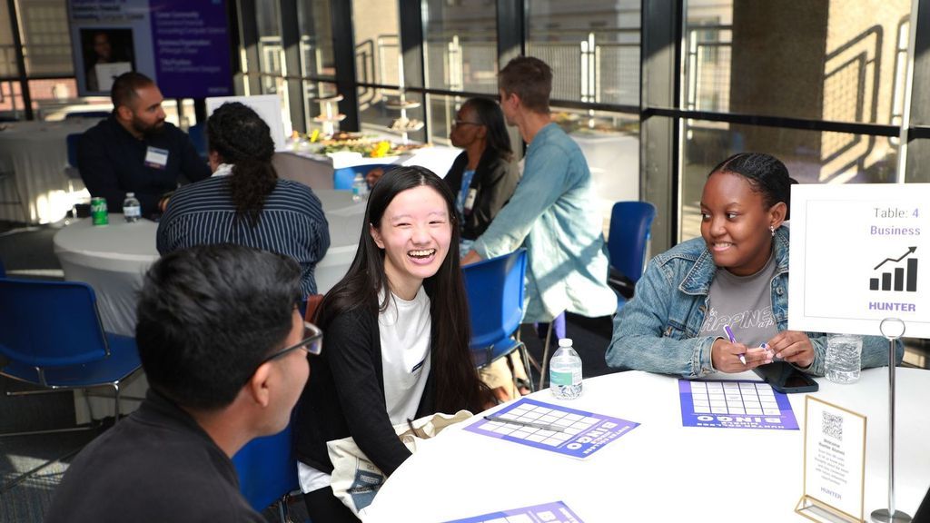 Students sitting around a table