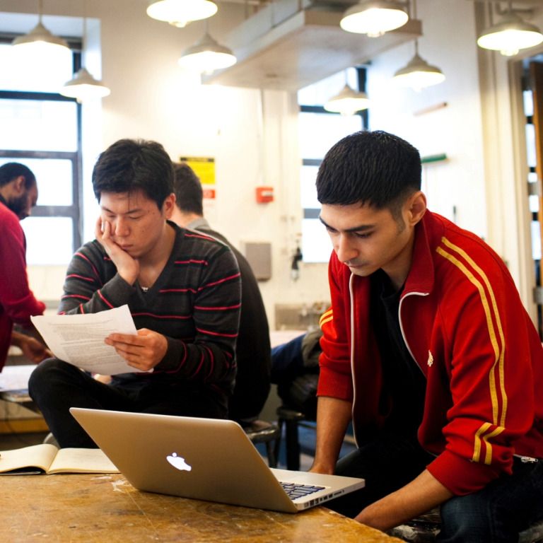 Hunter College students doing group work assignment.