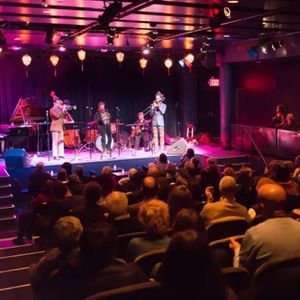 Musicians perform on stage at Symphony Space.