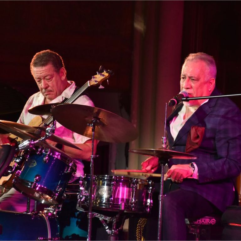 Guitarist and singer/drummer perform on stage at the Jazz and Cultural Forces concert at Center at the West Park.