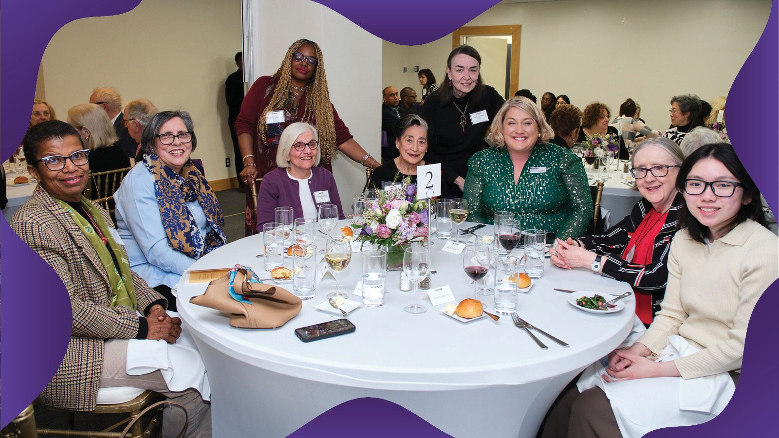 People gathered around a table at the Thomas Hunter Leadership Dinner