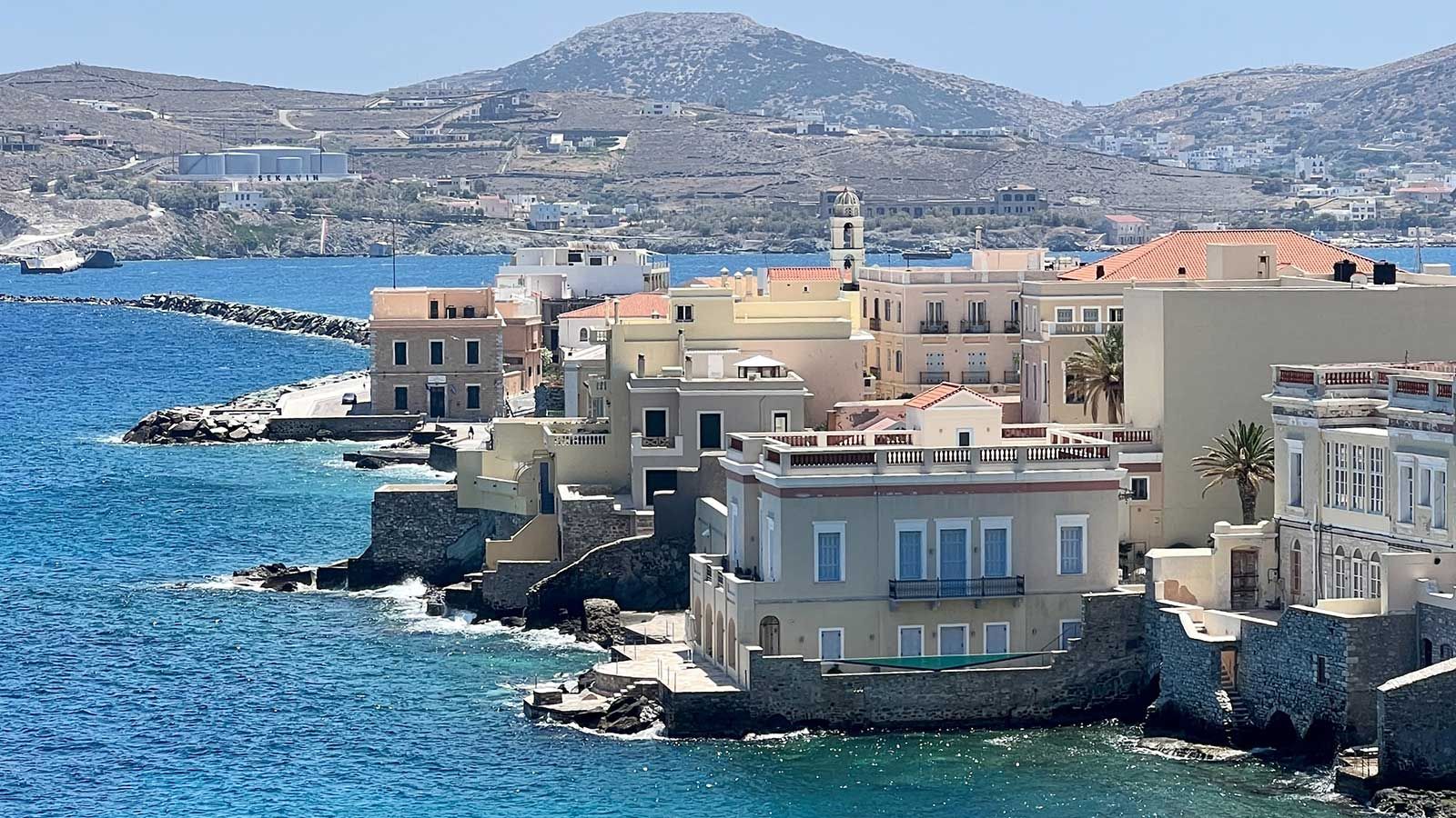 toula douka greece beautiful blue waterfront with buildings