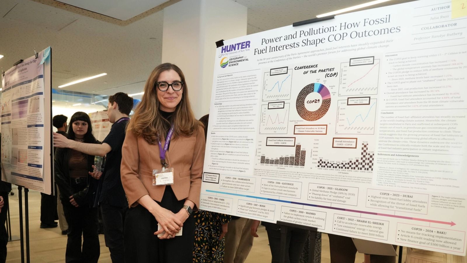student showcasing their research abstract poster at Hunter