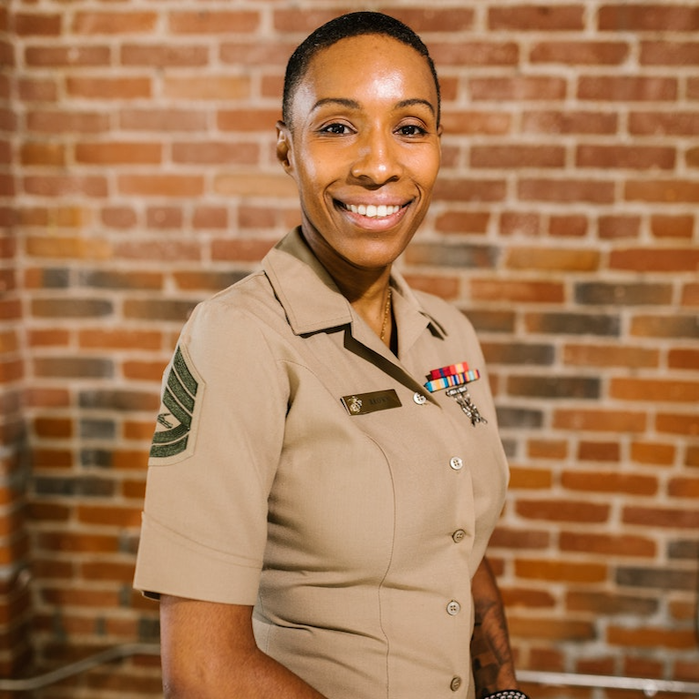 female veteran smiling