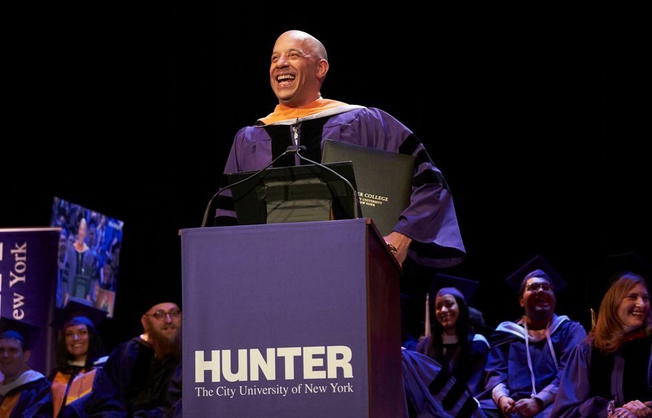 Vin Diesel at podium during commencement 