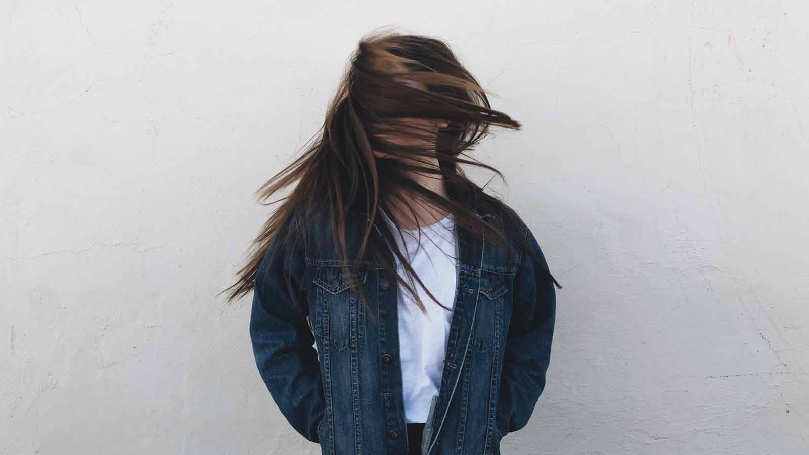 woman shaking her hair